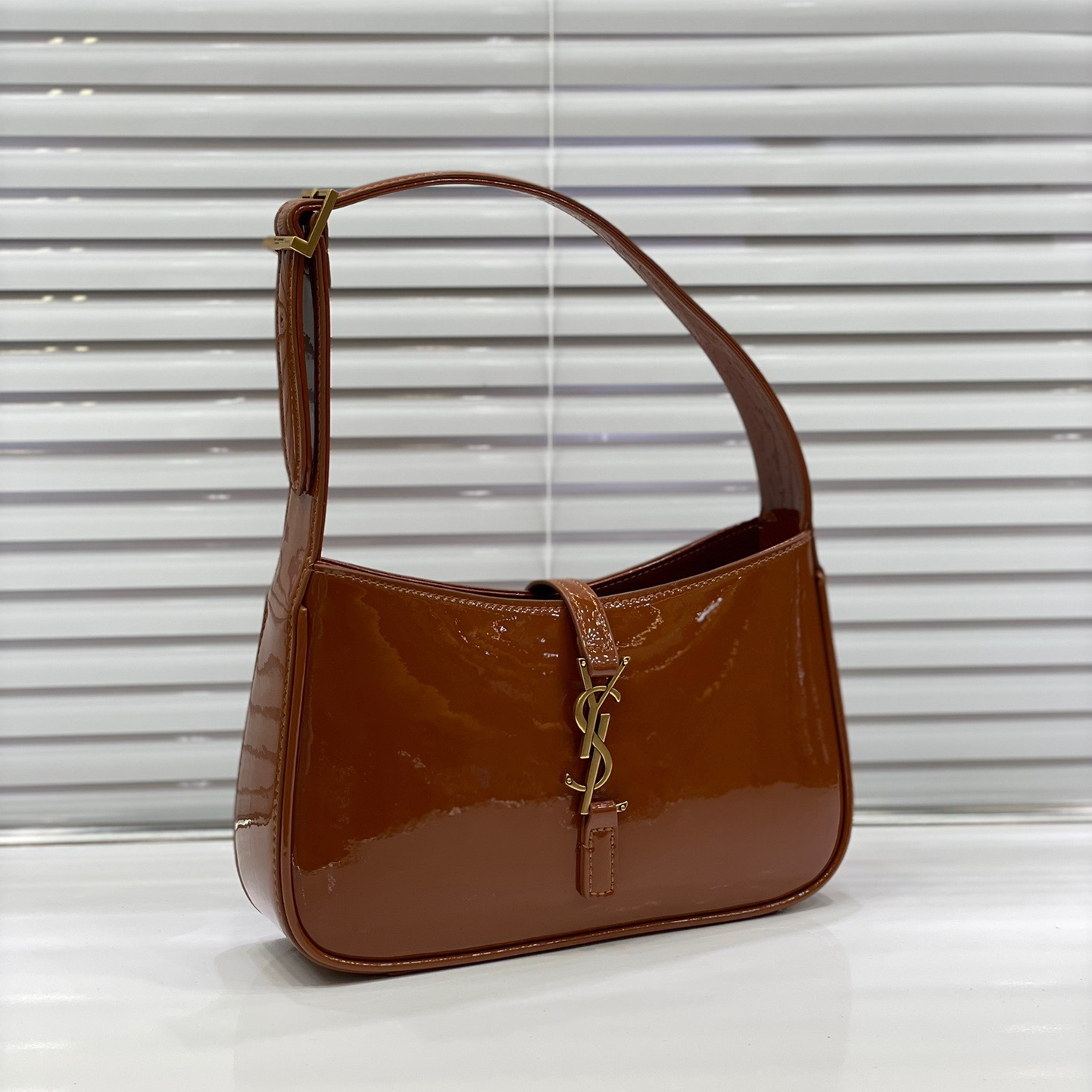 YSL-Lacquer leather armpit bag