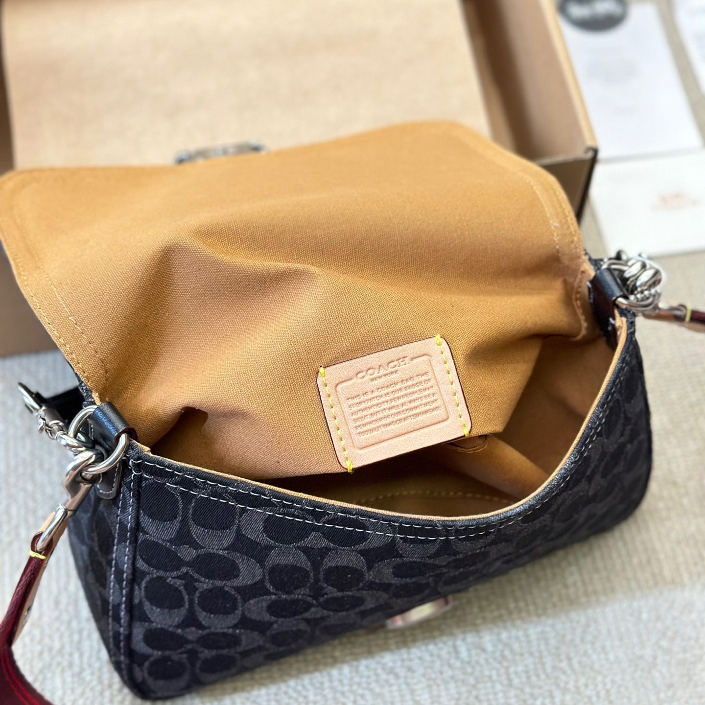 Coach-Embossed denim denim bag