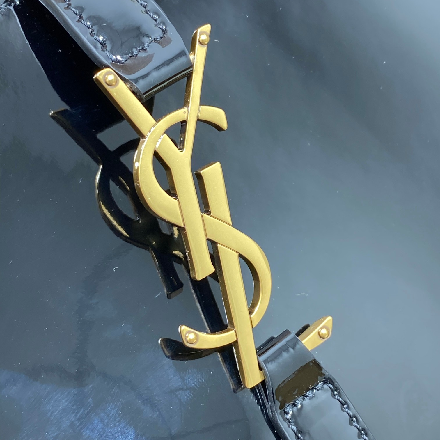 YSL-Lacquer leather armpit bag