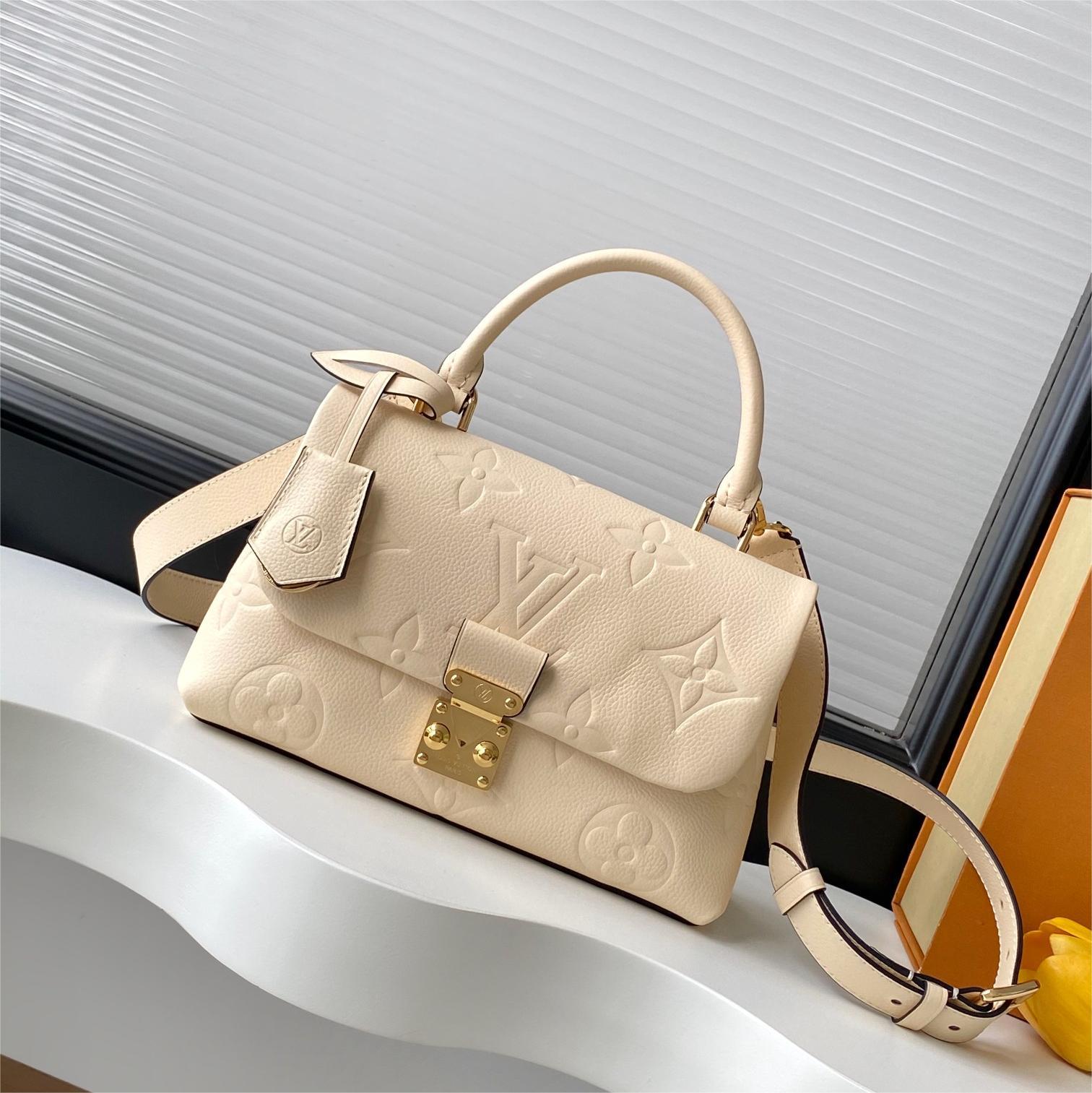 LV-White embossed Madeleine BB handbag