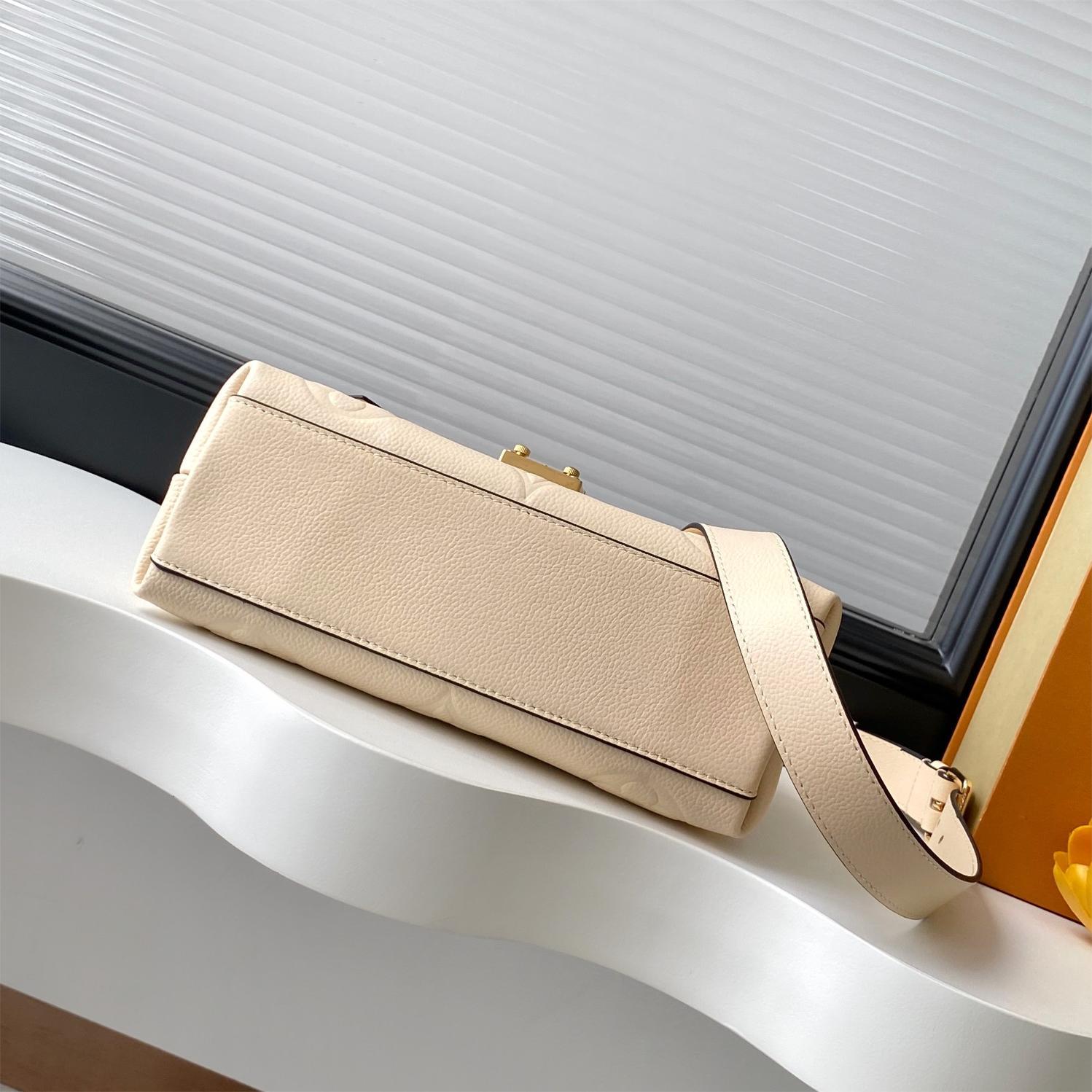 LV-White embossed Madeleine BB handbag