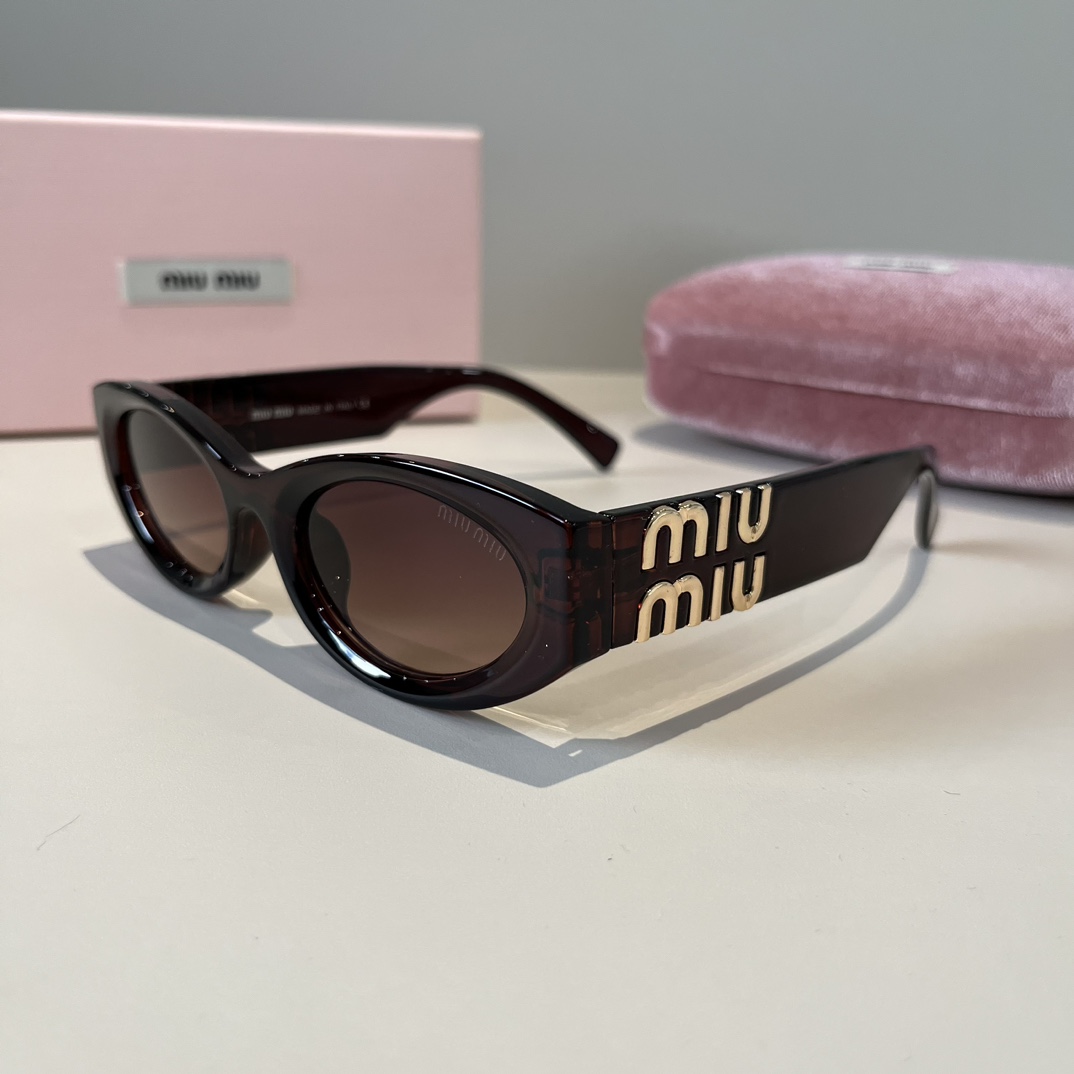 MIUMIU- cat-eye sunglasses