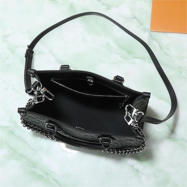 LV-OnTheGo Monogram embossed leather bag